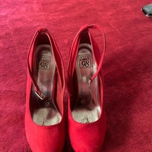 Sexy Red faux suede heels with back spikes. Women size 8, ankle buckle strap